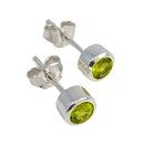 Peridot Ohrstecker in 925 Silberfassung, Facettenschliff (Ø 4mm)